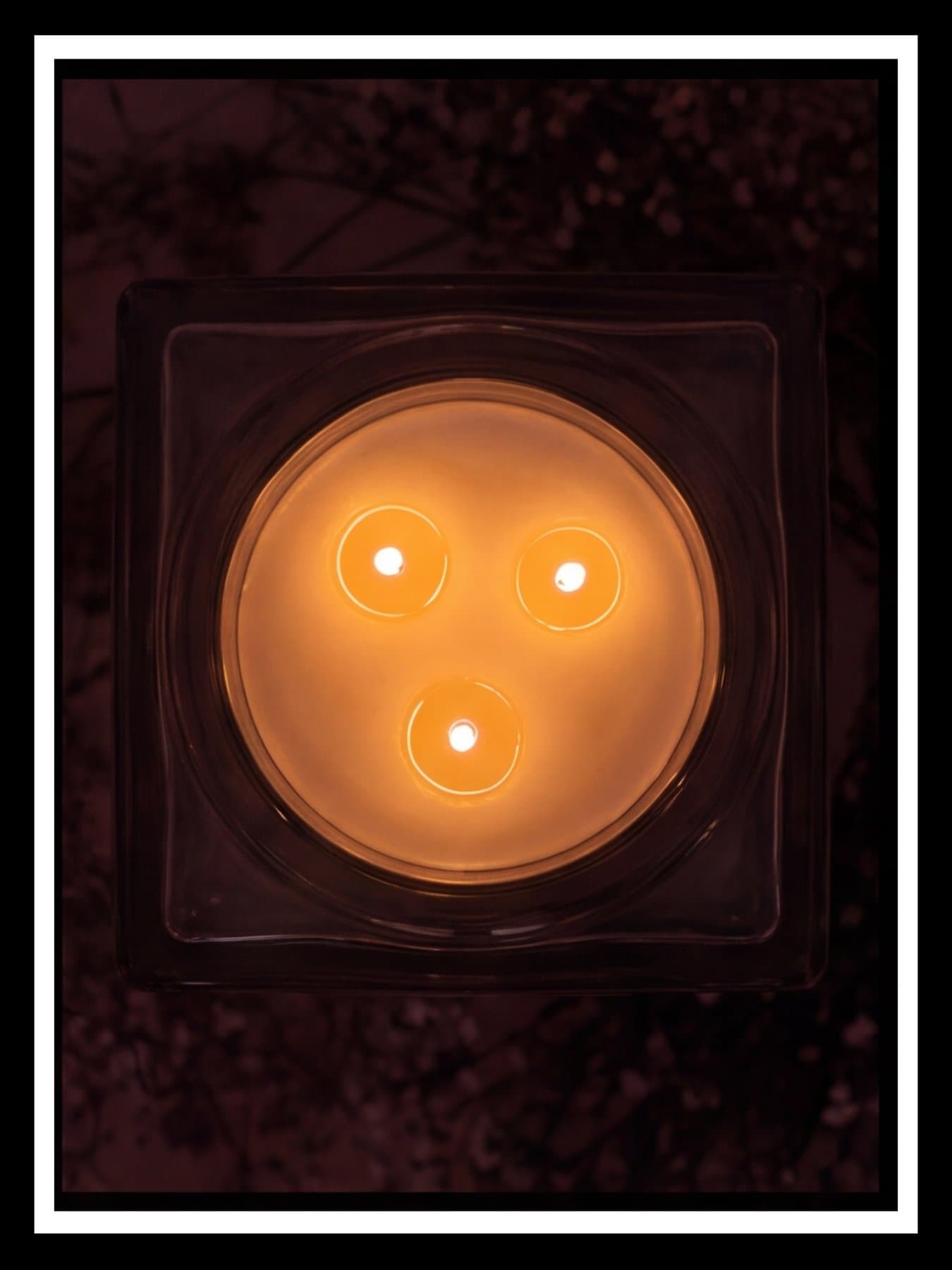 The three-wick candle from above