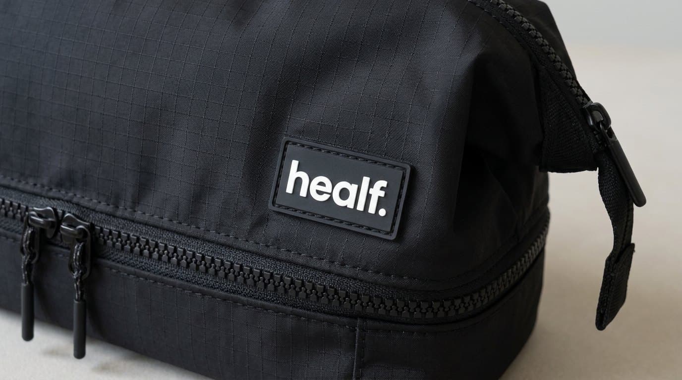 The black wash bag, the patch and zip close