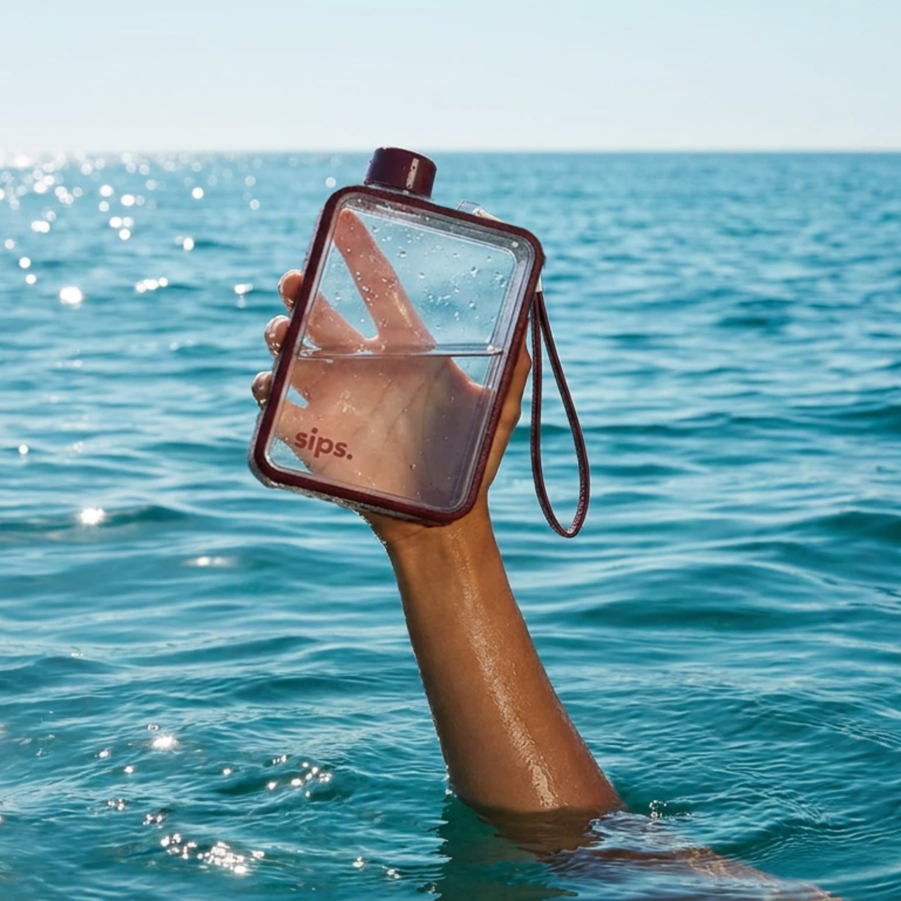 The bottle held above the sea, the Amazon tile